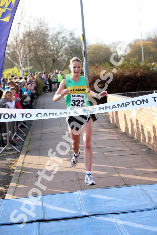 Claire Simpson (Chester-le-Street) finising 2nd in the Brampton to Carlisle 10 mile